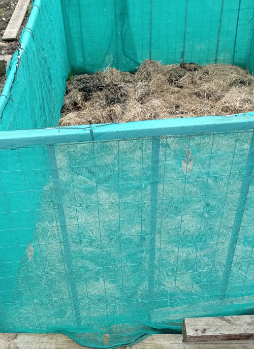 Raised bed created using netting for the sides