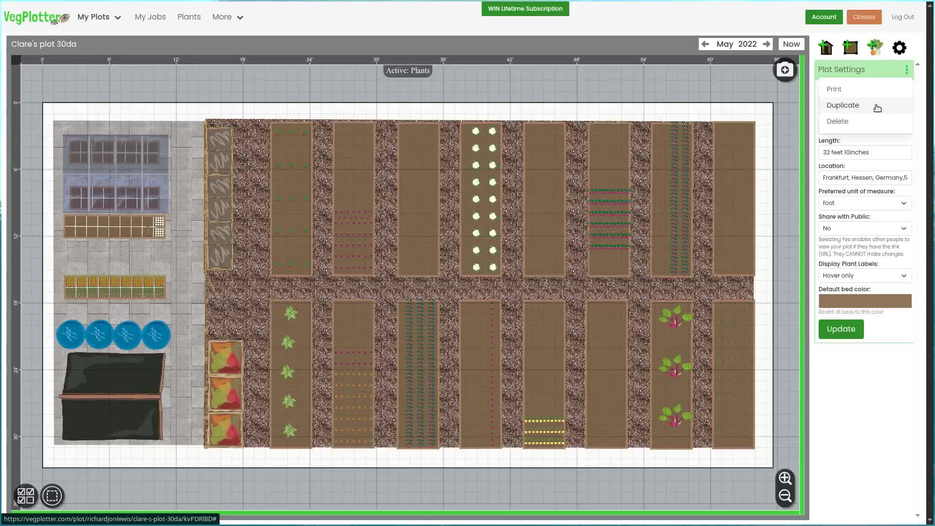 screenshot of vegplotters garden planner showing a garden plan with lots of beds, a shed and an greenhouse